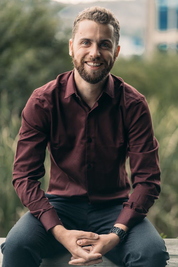 Curtis Allen in red button up shirt